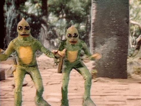 land of the lost gif|sleestak gif.